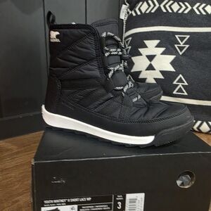 Black Winter Boots with White Soles